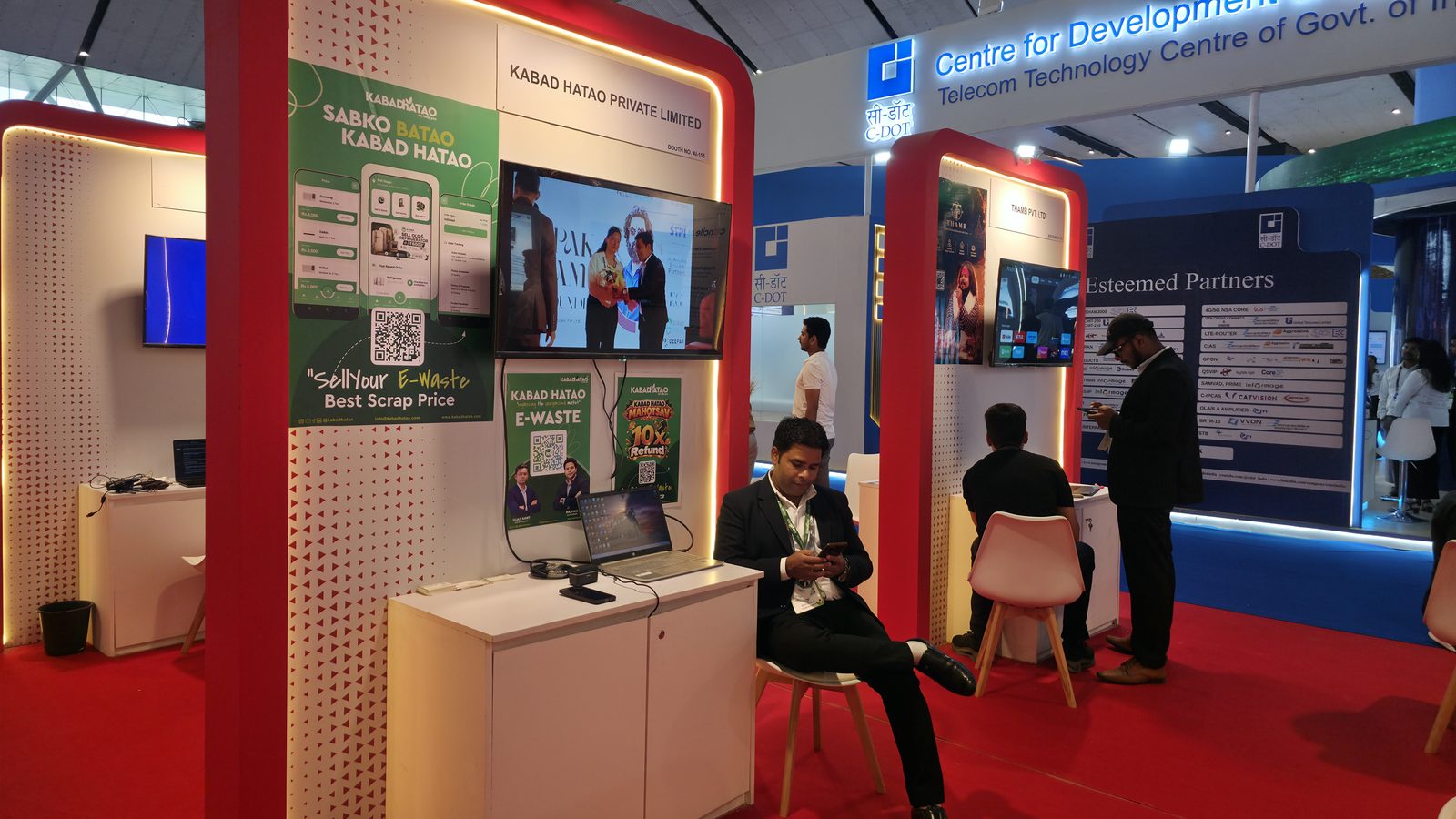 Kabad Hatao booth on the IMC show floor, beside neighbouring stalls.
