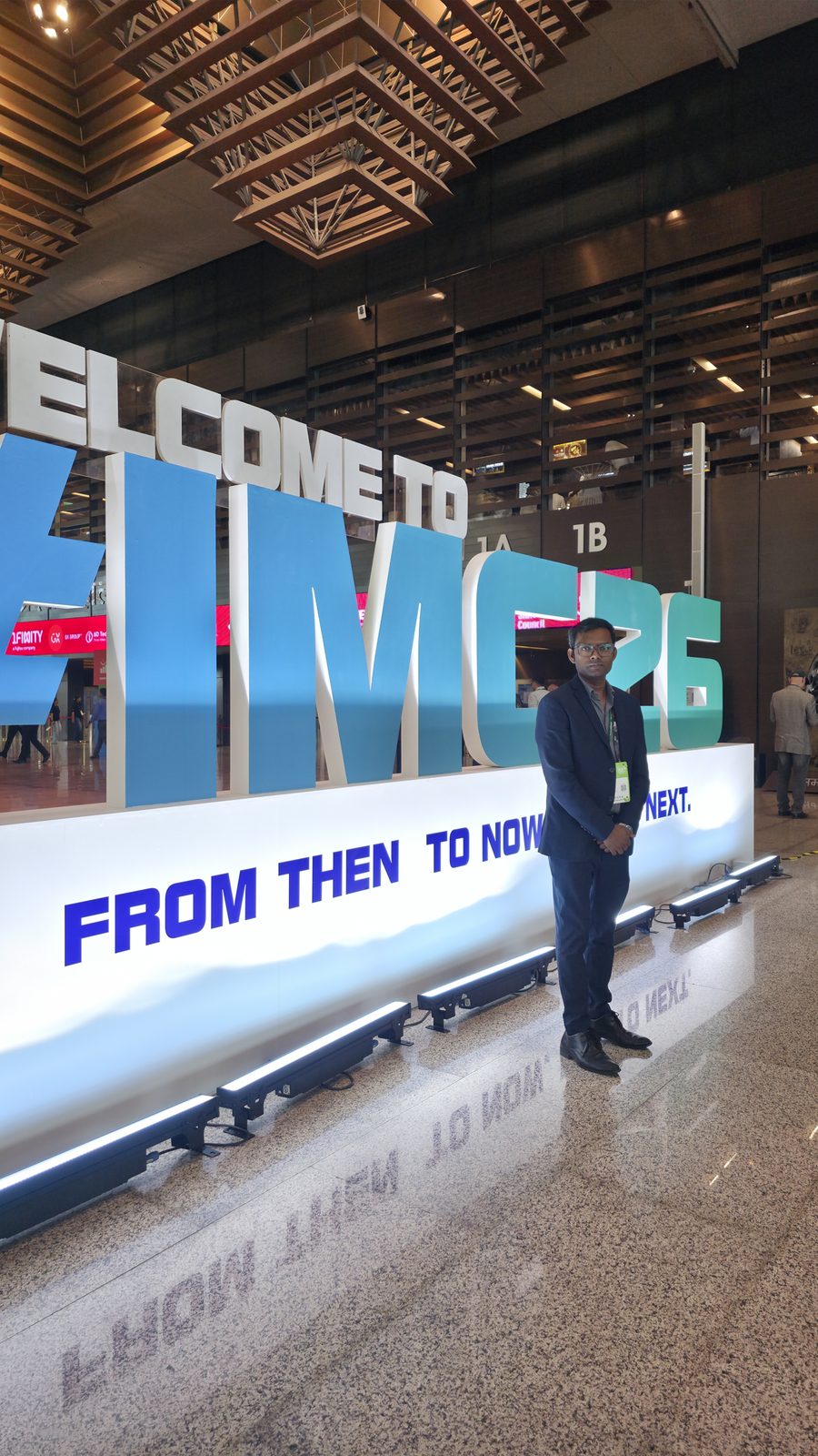 Another frame of the team at the IMC welcome sign.
